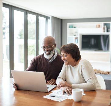 Older couple paying bills