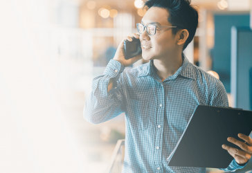 Man talking on phone smiling