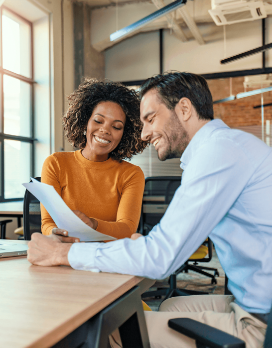 Woman and man looking at papers