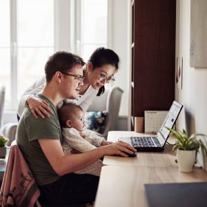 Family Looking at Laptop