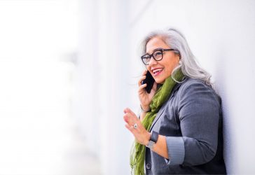 Woman talking on the phone, smiling