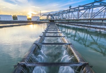 Aerial panoramic view of modern urban wastewater treatment plant water purification in process