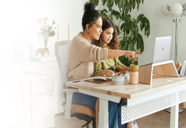 Woman with child on computer