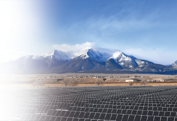 Solar Farm in front of Mountains