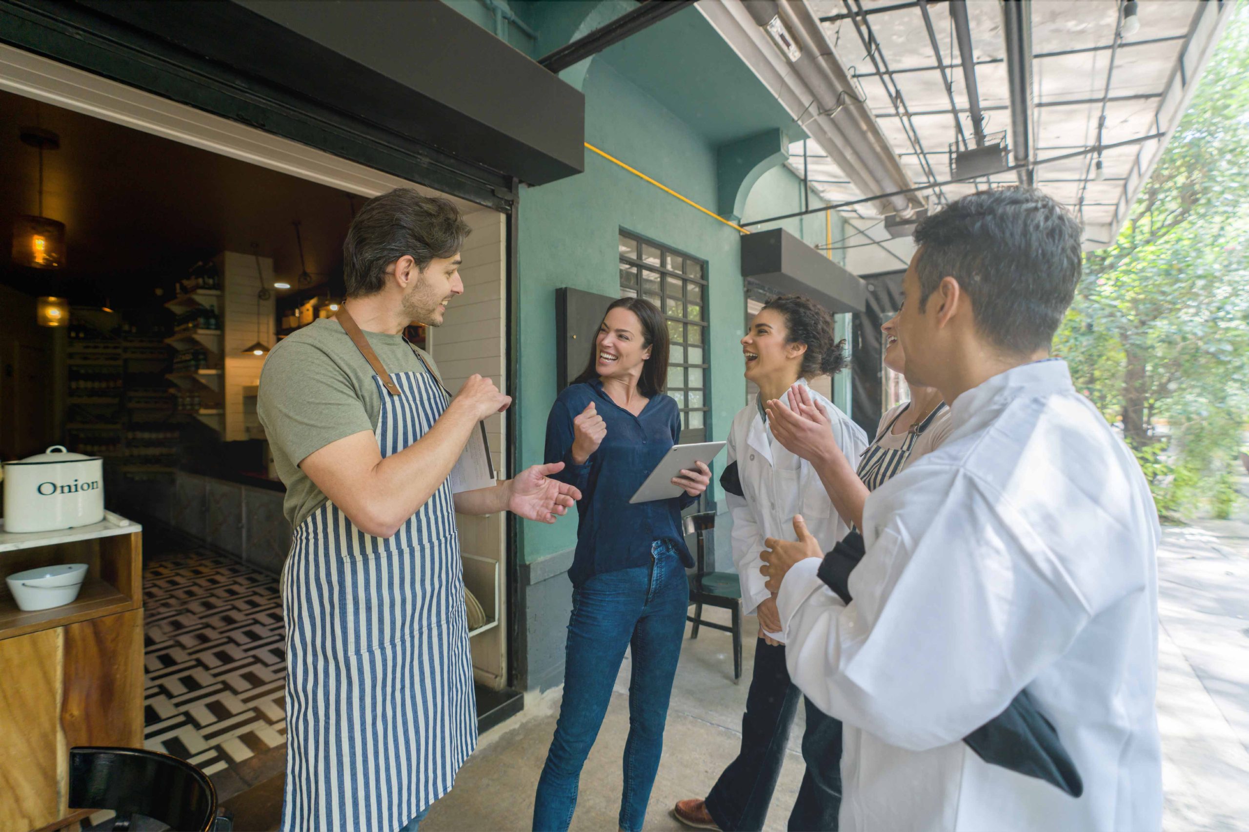 group of employees talking at restaurant