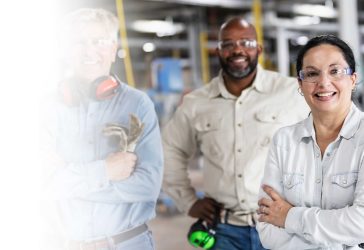 Factory Workers Smiling at Camera